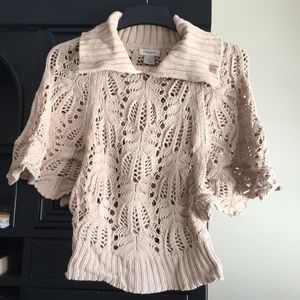 Neutral crochet sweater with flutter sleeves